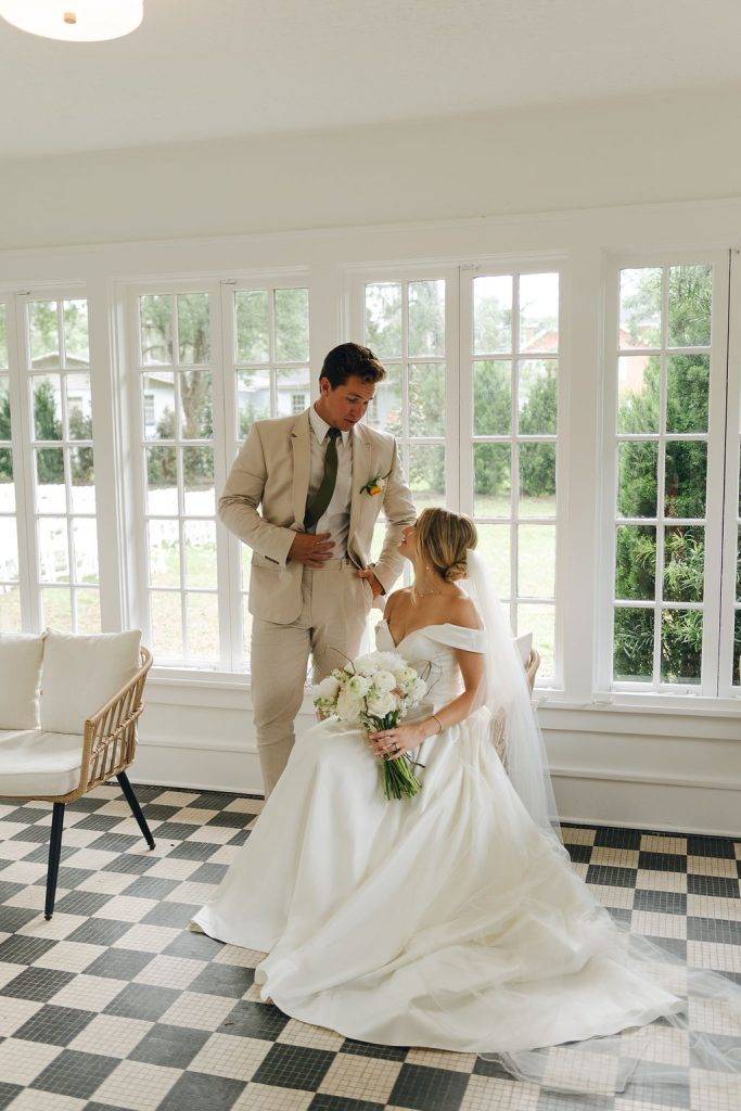 Black &amp; White tile sunroom wedding day portrait